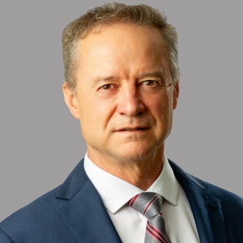 Portrait of Chris Goossen, Associate.